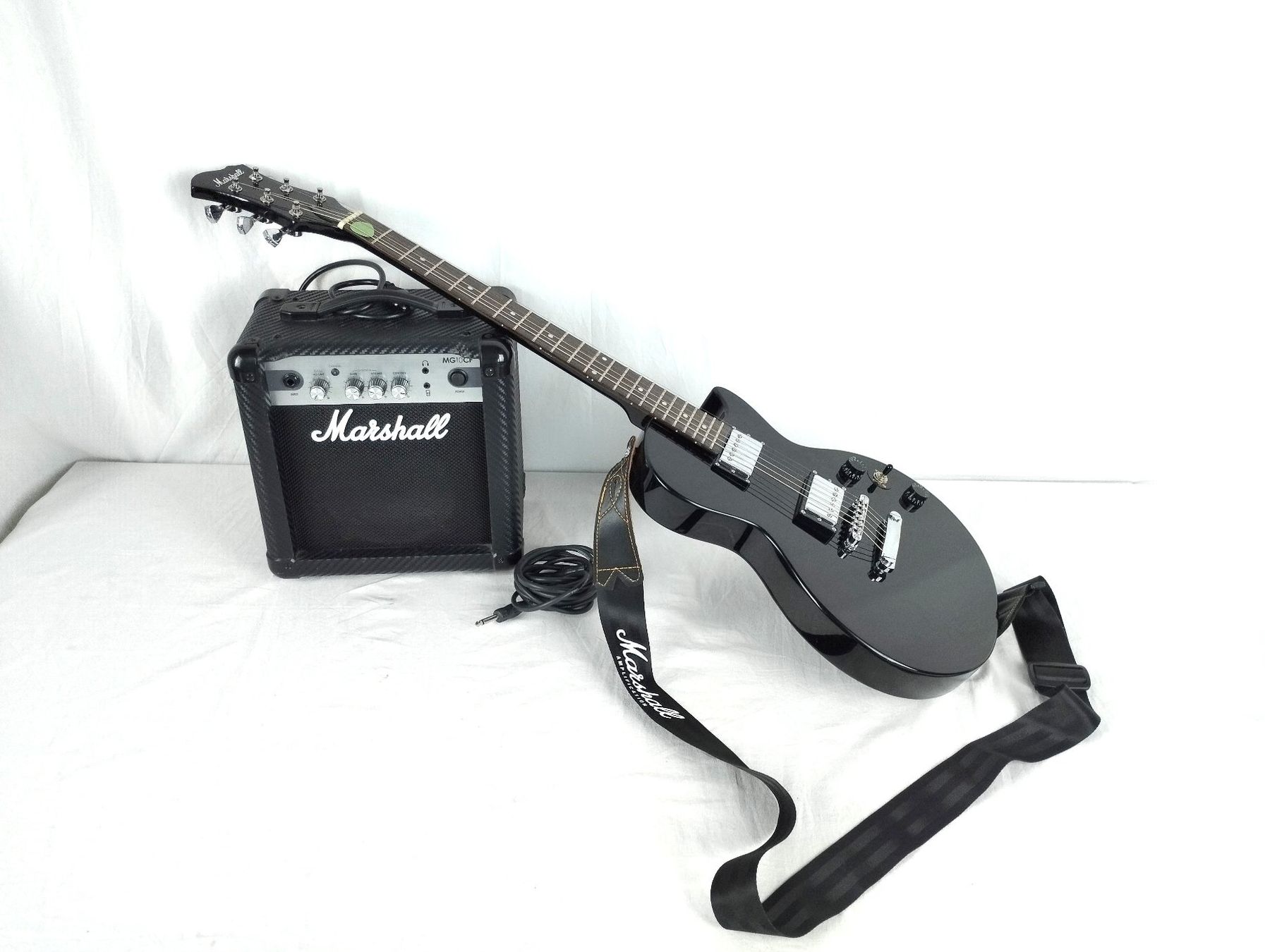 Marshall Instruments de musique: MARSHALL E-Gitarre und Verstärker – D'occasion à Schübelbach par Restwert_Schubelbach