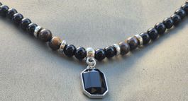 Collana pietre onice occhio di tigre ciondolo nero