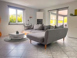 Canapé d'angle gris bon état pieds bois