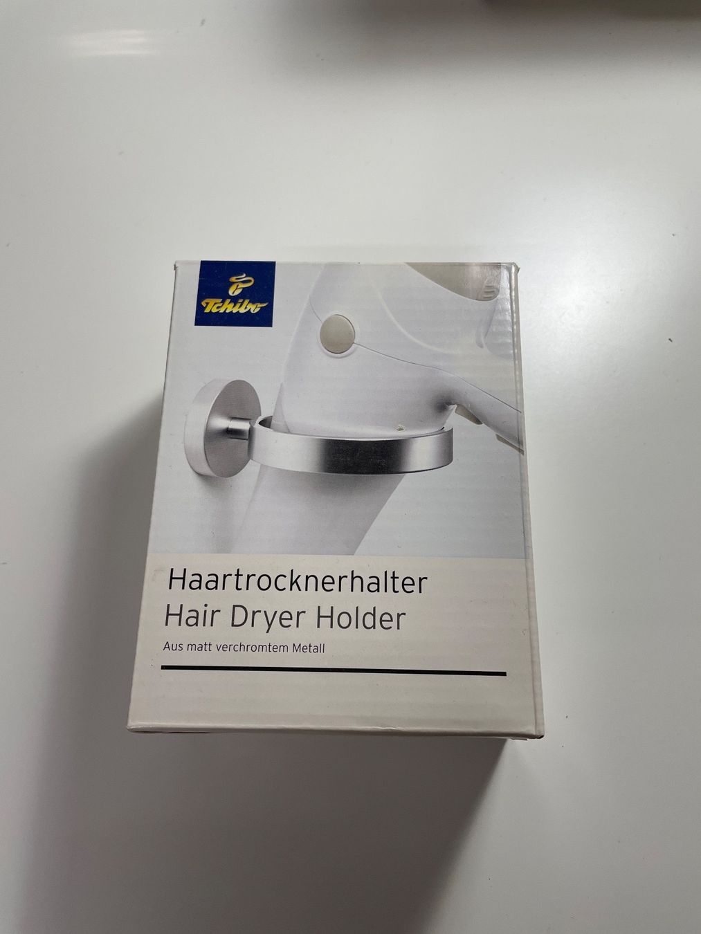 Supporti a parete: Haartrocknerhalter – Nuovo e nell'imballaggio originale da Basel venduto da Robyn20
