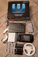 Wii U avec lot de jeux et accessoires divers