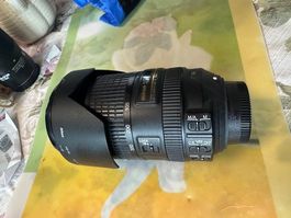 Objectif Nikon DX 18-300mm VR ED IF + Filtre UV B+W Germany