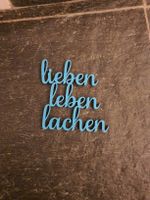 "Lieben, Leben, Lachen" Wanddeko Schriftzug