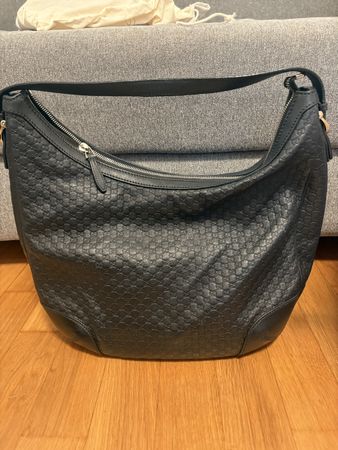 Gucci, black leather bag