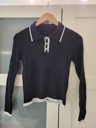 Pull confortable et élégant en bon état