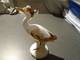 Vogel weiss/goldfarbig