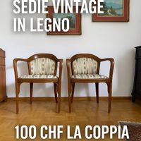 Coppia di sedie vintage in legno con braccioli 