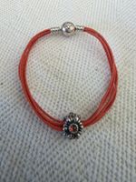 Pandora Stoffarmband in orange mit Blumenbead