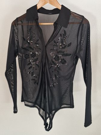Schwarzer Body mit Pailletten Gr. M transparent elegant