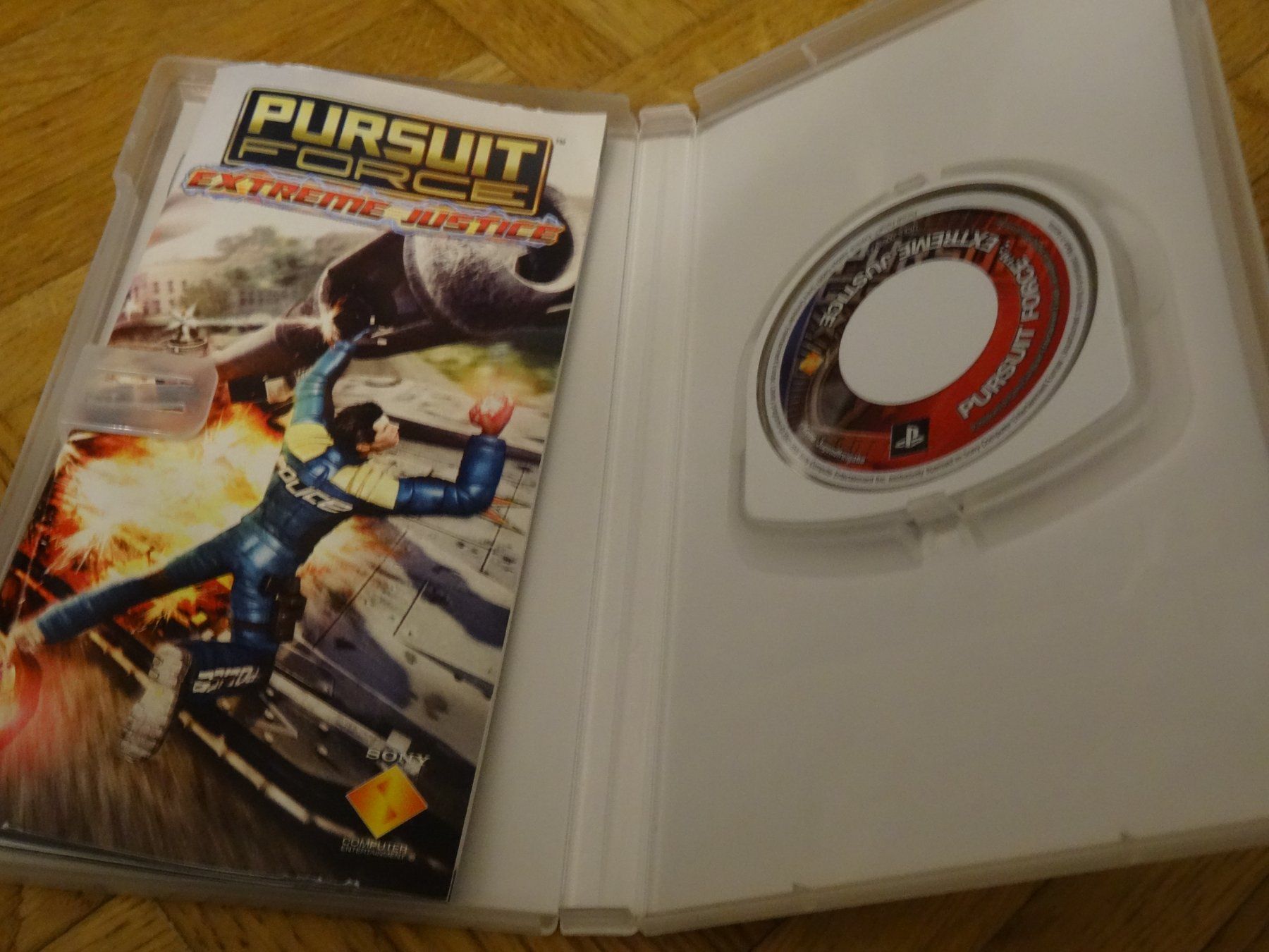 Sony Spiele: Pursuit Force Extreme Justice PSP – Gebraucht aus Olten von Disc-Ausverkauf 1