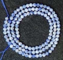 1 Strang rare Dumortierit in Dolomit Perlen 3 mm facettiert.