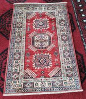 Orientteppich rot gemustert 130 x 84 cm