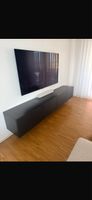 Besta Ikea schwarz hängend mit Gebrauchsspuren</div>