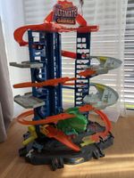 Hot Wheels Ultimate Garage Spielzeug mit Dinosaurier