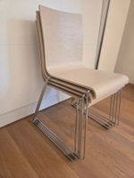 4 chaises en chêne blanchi et pieds "luge" de Batiplus