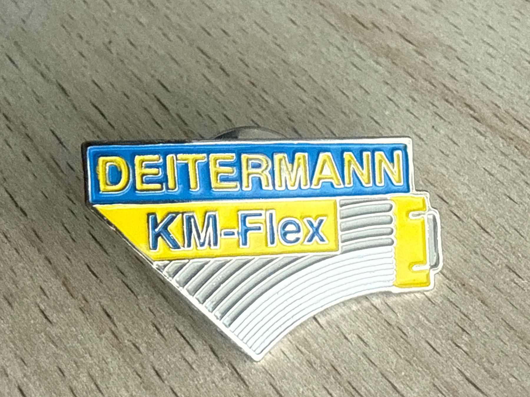 Plaketten & Abzeichen: Pin Deitermann KM-Flex – Gebraucht aus Glattbrugg von Schweigmatt