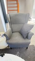 Fauteuil à oreilles IKEA Strandmon gris en bon état