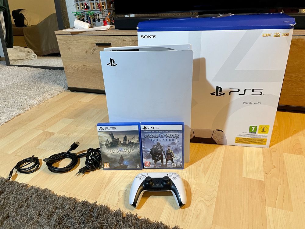 Gebrauchte PS5 mit Laufwerk, 2 Spielen, Kontroller Kaufen auf Ricardo