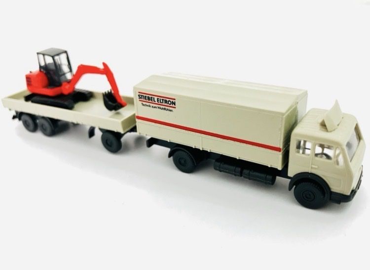 Modellini di ferrovie: LKW Stiebel Eltron + Bagger SPUR N #160 – Usato da Oberbuchsiten venduto da Orsetto24
