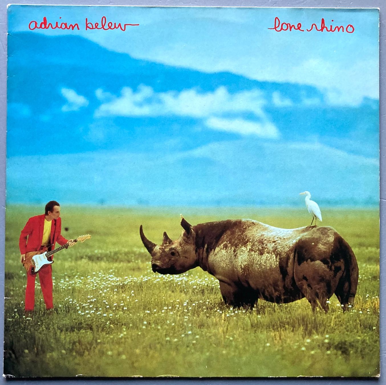 Vinyles: ADRIAN BELEW - LONE RHINO – D'occasion à Poliez-Pittet par Newtown-Records