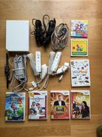 Nintendo Wii, Let‘s Sing inkl. Mikrophone, Mariokart etc.