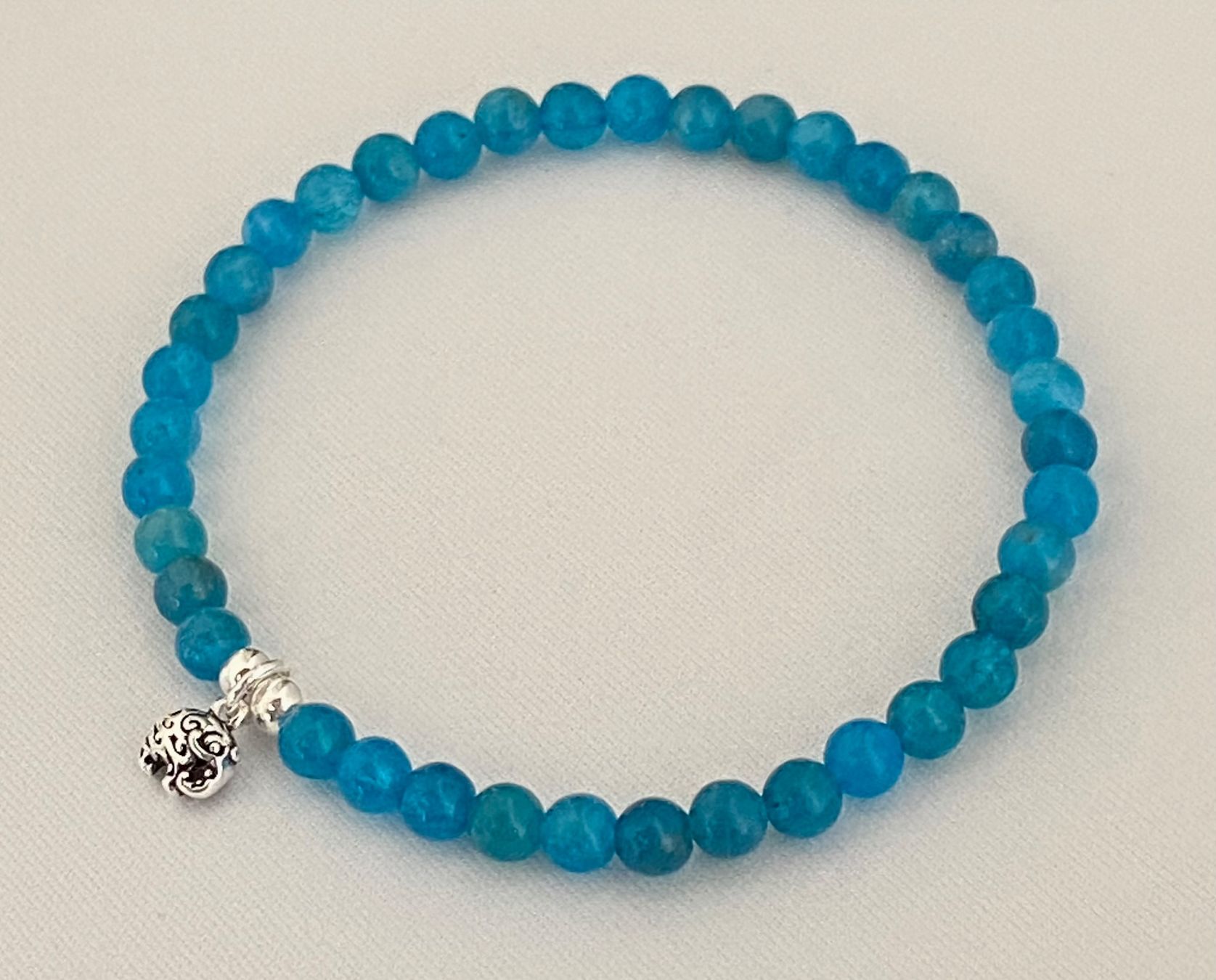 Bracciali & Braccialetti: Edelstein Armband Apatit mit Silber auf Mass – Nuovo e nell'imballaggio originale da Zuzwil SG venduto da Lemliskat 1
