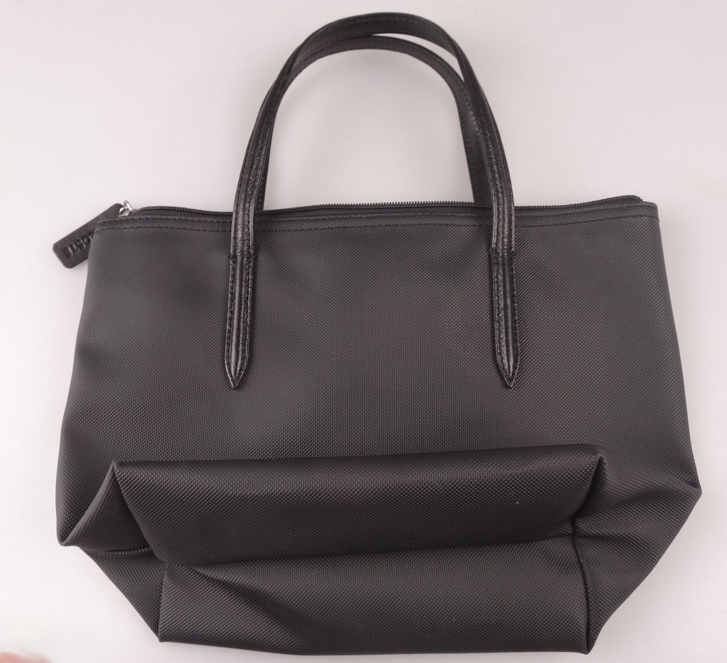 Lacoste Sacs femmes: Lacoste Tasche aus Kunststoff – D'occasion à Volketswil par brockipfannenstil 1