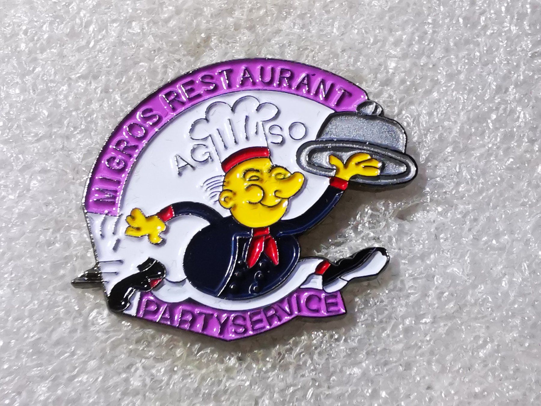 Plaketten & Abzeichen: Ansteckpin 99: Migros Restaurant Partyservice – Gebraucht aus Oppligen von Pin-Fall-Shop