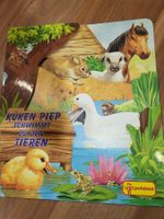 Küken Piep schwimmt zu den Tieren