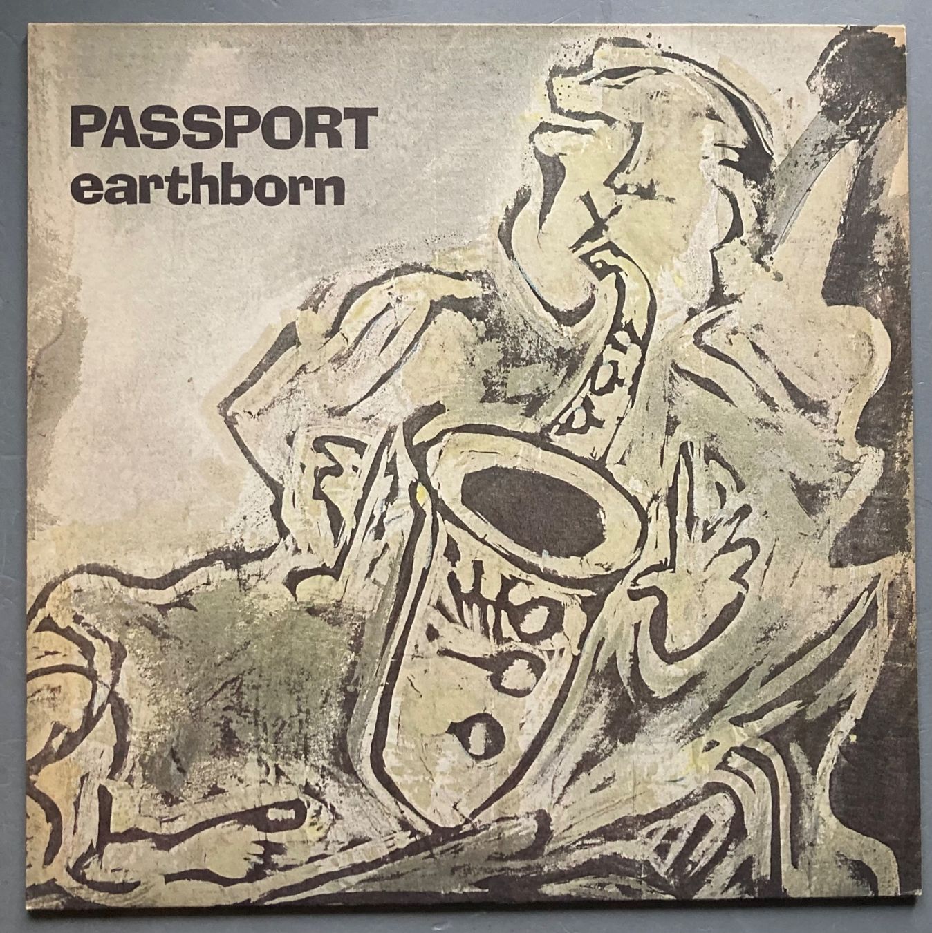 Vinyles: PASSPORT - EARTHBORN – D'occasion à Poliez-Pittet par Newtown-Records