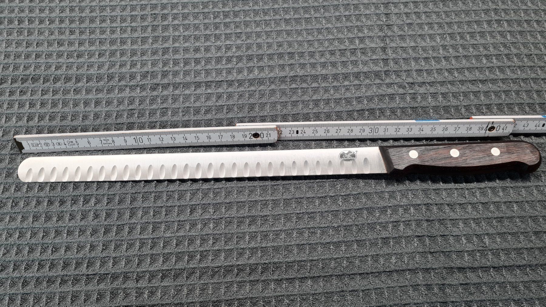 Victorinox Coltelli da cucina: Victorinox Lachsmesser mit Holzgriff – Usato da Wangen SZ venduto da mollosser