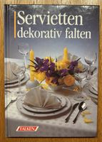 Buch, Servietten dekorativ falten