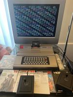 PHILIPS VIDEOPAC G7400 CONSOLE with 128 games and SONY TV!
