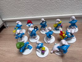 12 grosse Schlümpfe auf Sockeln, von Peyo