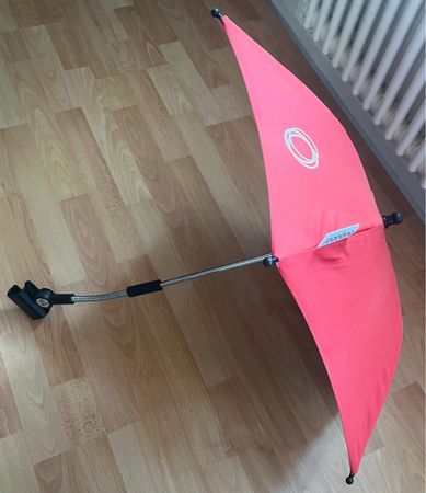 Ombrelle Bugaboo rouge pour poussette  bon état