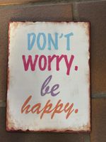 Metallschild „Don‘t worry, be happy“