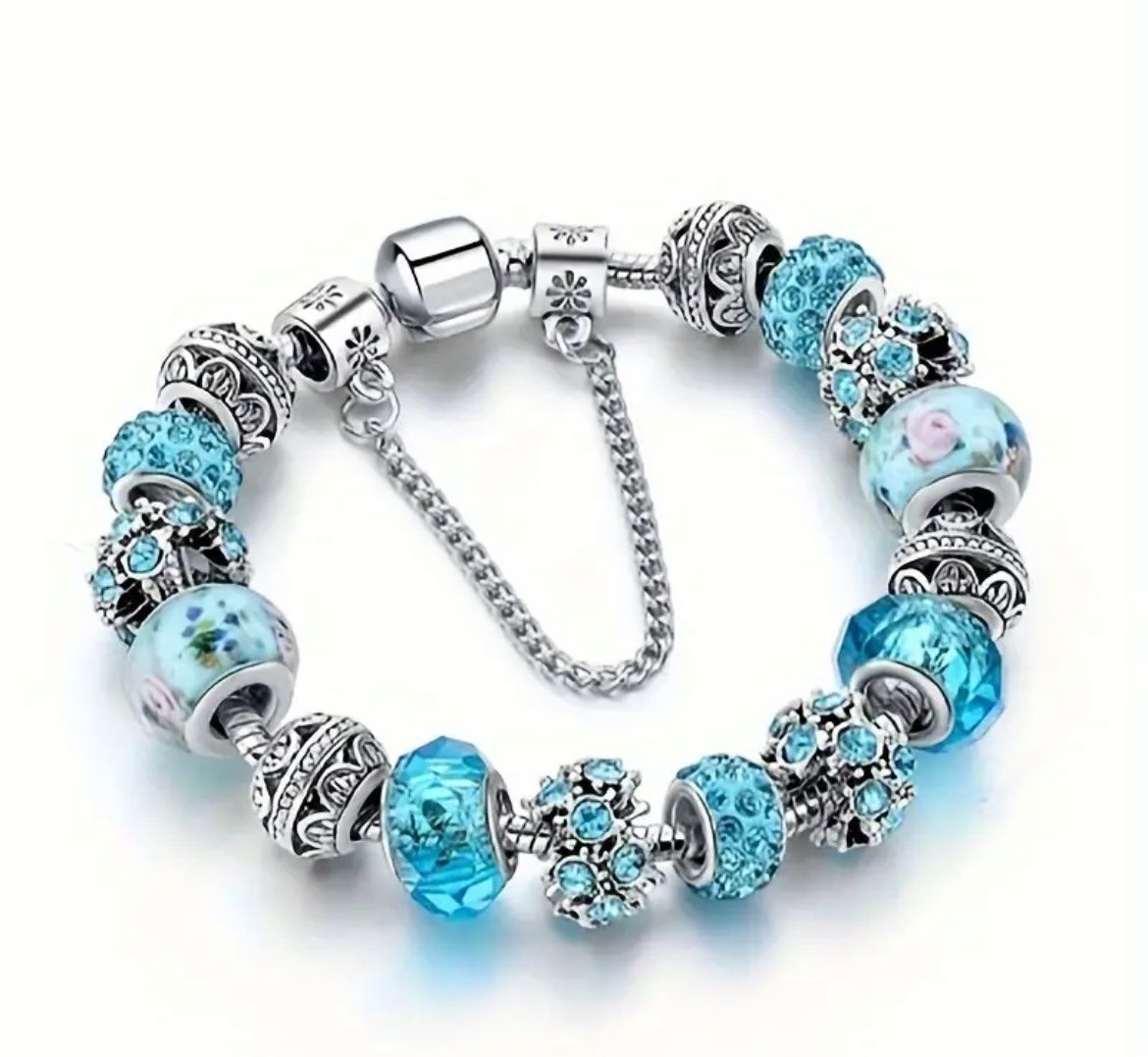 Bracciali & Braccialetti: Armband mit blauen Strassperlen – Nuovo e nell'imballaggio originale da Kloten venduto da des_xv52