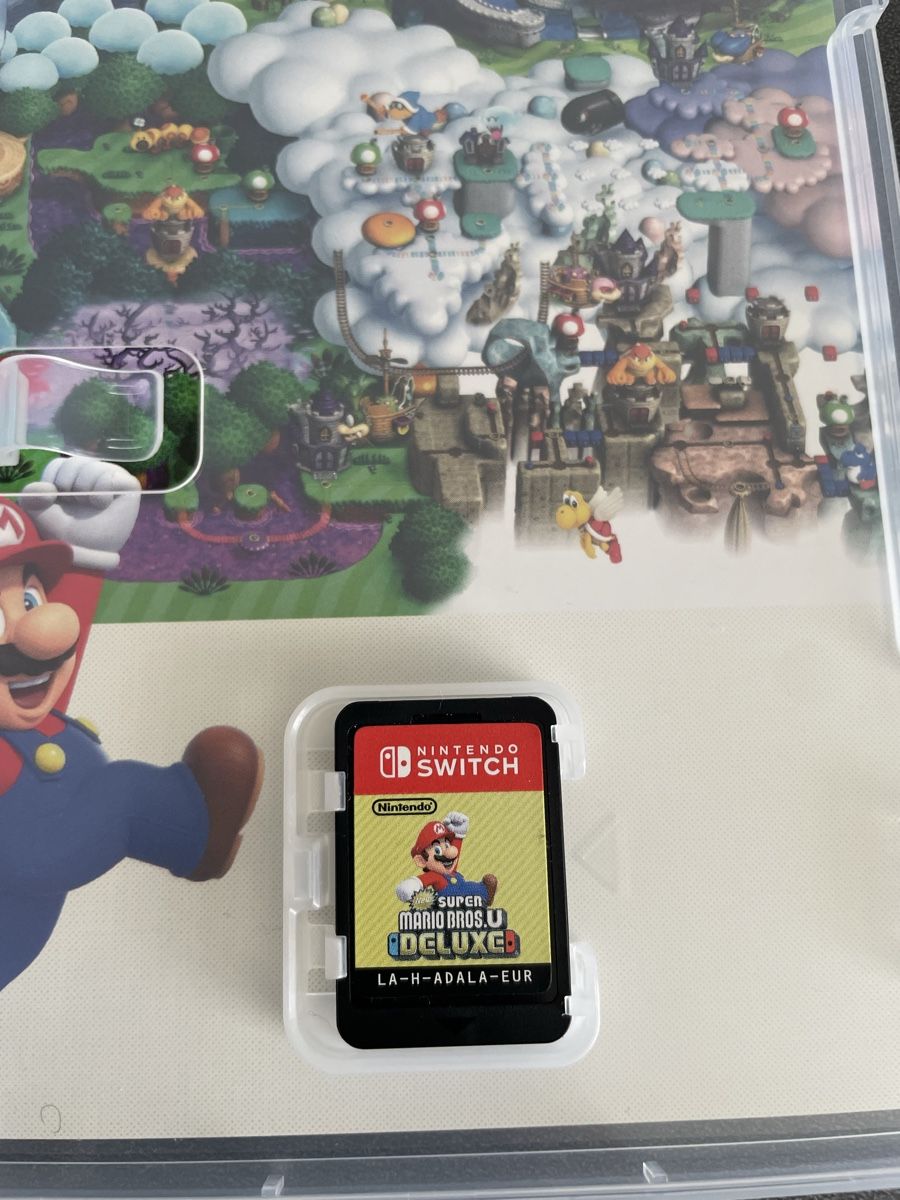 Nintendo Spiele: New Super Mario Bros U Deluxe – Gebraucht aus Wolfenschiessen von Ovomaltineguetzli 2