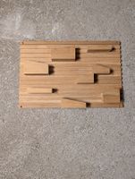 Wandaufhängung mit modularen Staubehältern