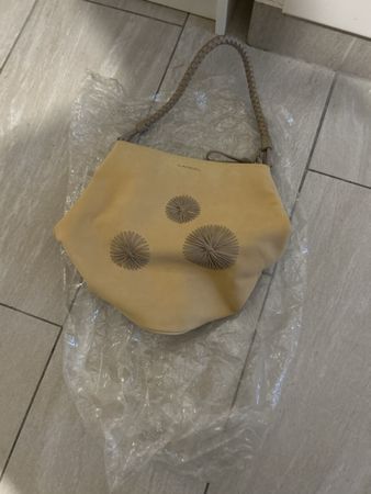Sac à main Lancel beige avec anses tressées en cuir