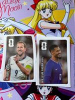 Saliba und Kane Cola Sticker WM 26