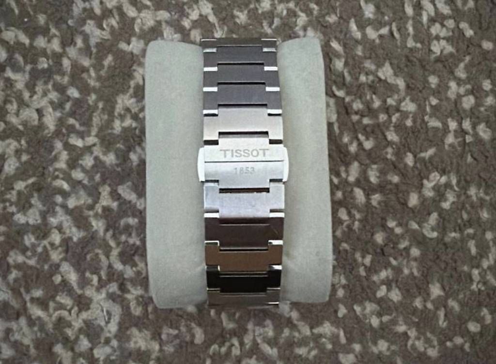 Tissot Uhren: Tissot PRX schwarz quarz 40 mm – Gebraucht aus Basel von Adri.M 1