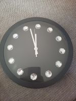 Wanduhr schwarz 