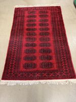 Handgeknüpfter Teppich rot/schwarz 190x124 cm guter Zustand
