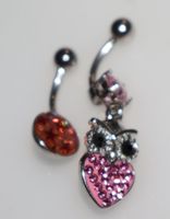 Lot de 2 piercings nombril avec lingette désinfectante 