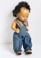 Kleine asiatische antike Puppe aus Masse