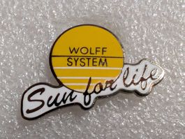 Ansteckpin 274: Wolff System