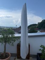 Sonnenschirm mit Gewichten