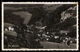 AK Goumois, Village dans la vallée avec église et falaises