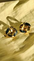 Orecchini clip dorati con inserti blu